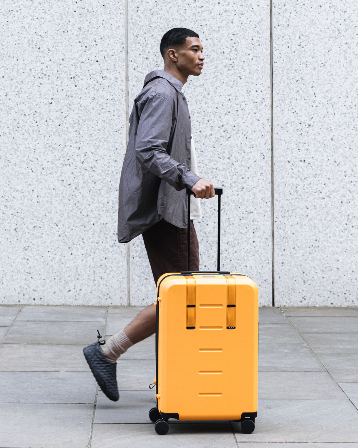 D_b_ Ramverk Check-in Luggage Medium Parhelion Orange