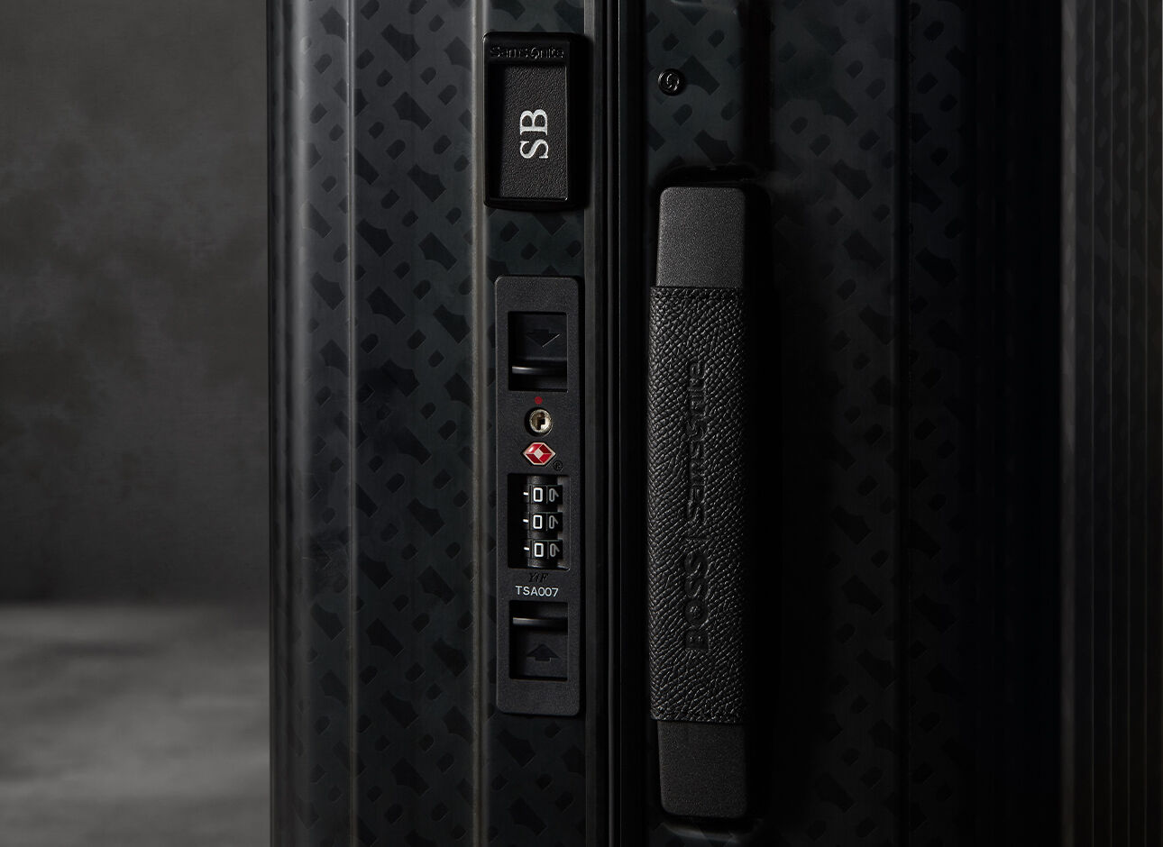 Samsonite BOSS Trolley mit 4 Rollen 76cm Graphite Monogram