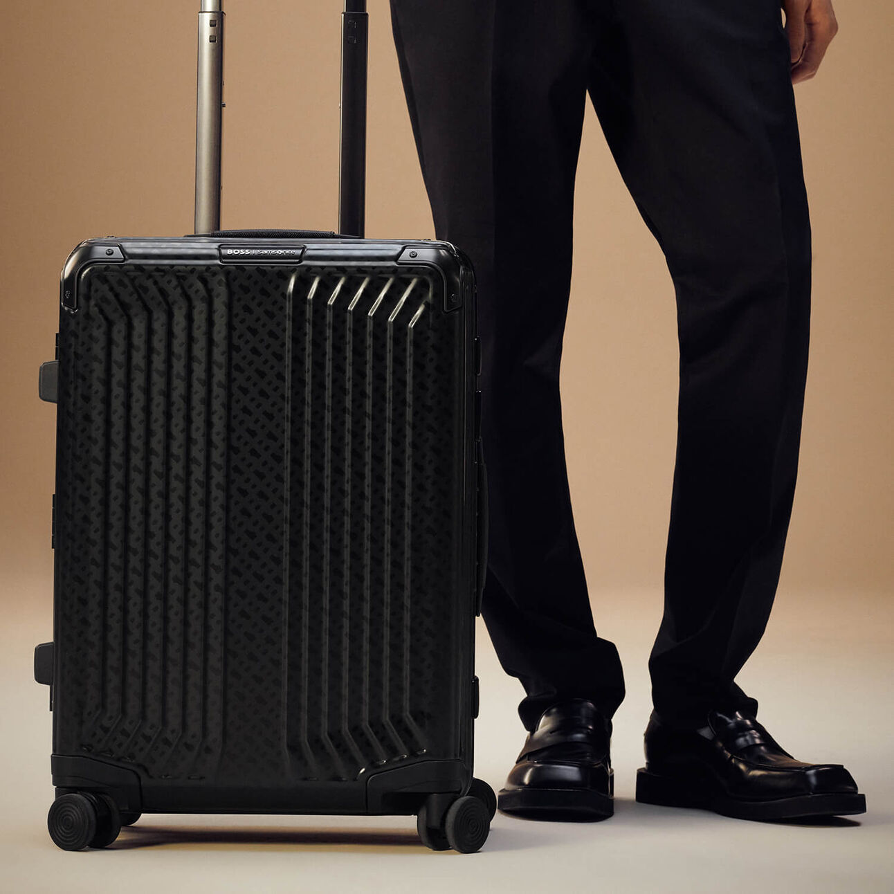 Samsonite BOSS Trolley mit 4 Rollen 69cm Graphite Monogram