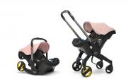 Doona Doona+ 2-in-1 Babyschale mit ausklappbarem Fahrgestell Blush Pink jetzt online kaufen