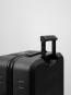 D_b_ Ramverk Check-in Luggage Medium Black Out